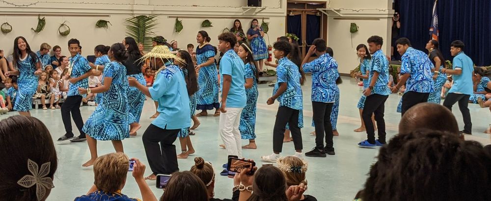 High School Marshallese students perform a dance.